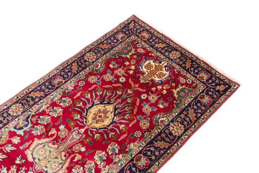 Surface texture of 2002s Tabriz rug with natural Wool and intricate pattern