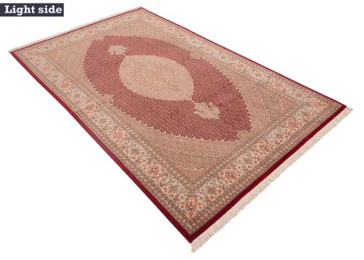 Full view of New Tabriz rug from Iran / Persia, 316 × 201 cm in Red tones