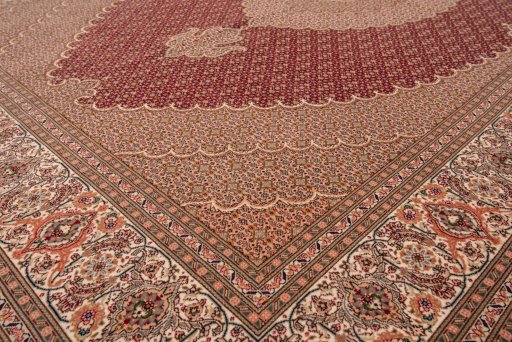 Close-up detail of New Tabriz rug from Iran / Persia showing Wool weave