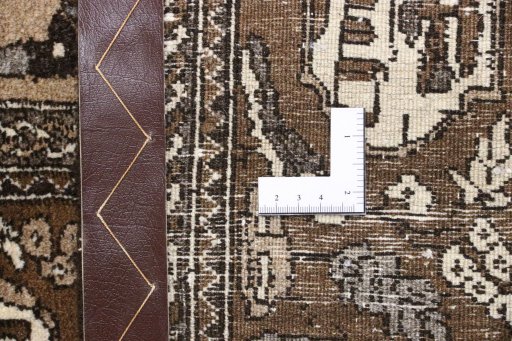 Corner detail of 1990s Tabriz rug showing border pattern and Wool pile