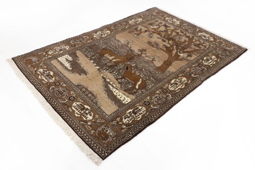 Corner detail of 1990s Tabriz rug showing border pattern and Wool pile