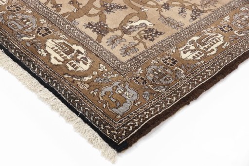Backside of handmade 1990s Tabriz rug showing knot structure and weave density