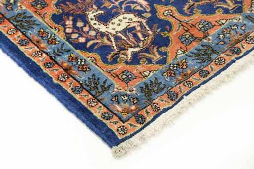 Backside of handmade 1990s Tabriz rug showing knot structure and weave density