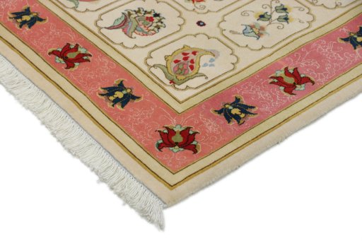 Backside of handmade New Tabriz rug showing knot structure and weave density