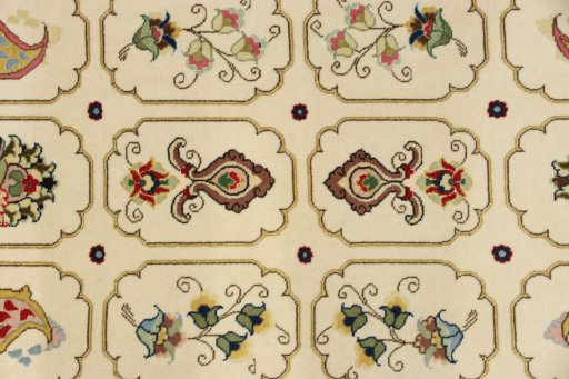 Close-up detail of New Tabriz rug from Iran / Persia showing Wool weave