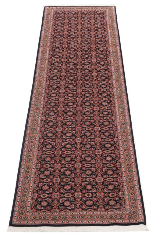Close-up detail of New Tabriz rug from Iran / Persia showing Wool weave