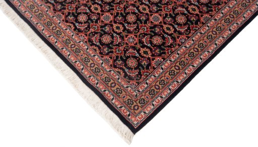 Close-up detail of New Tabriz rug from Iran / Persia showing Wool weave