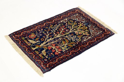Corner detail of 2000s Tabriz rug showing border pattern and Wool pile