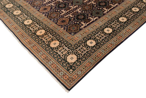 Corner detail of New Tabriz rug showing border pattern and Wool pile