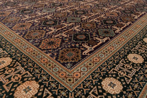 Close-up detail of New Tabriz rug from Iran / Persia showing Wool weave