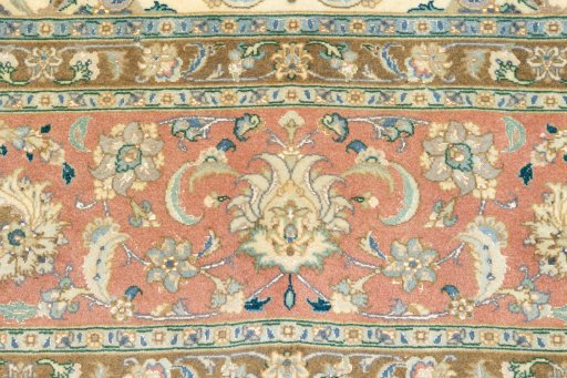 Surface texture of 2019s Tabriz rug with natural Wool and intricate pattern