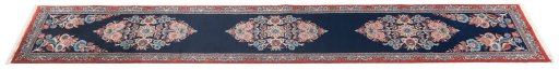 Backside of handmade New Tabriz rug showing knot structure and weave density