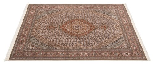 Corner detail of New Tabriz rug showing border pattern and Wool pile