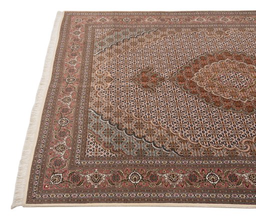 Close-up detail of New Tabriz rug from Iran / Persia showing Wool weave