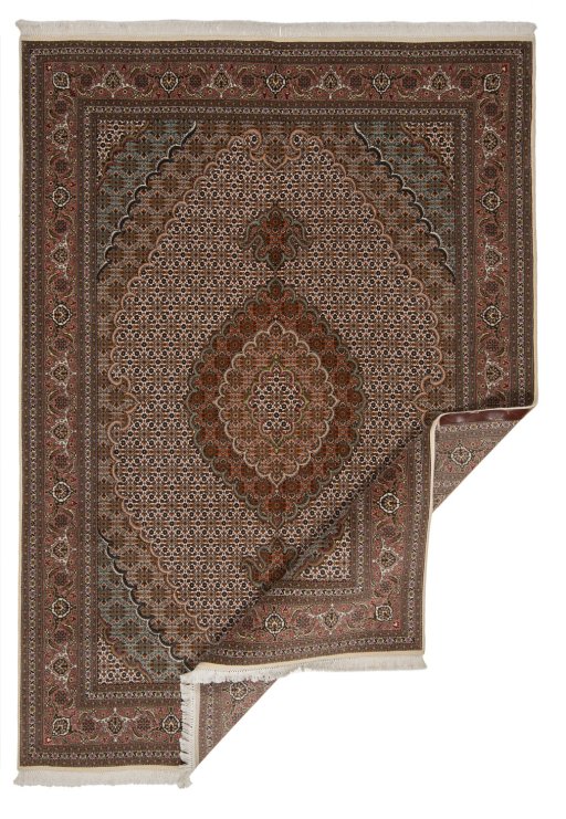 Central medallion detail of New Tabriz rug from Iran / Persia