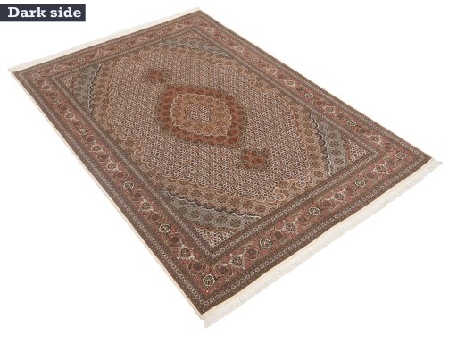 Close-up detail of New Tabriz rug from Iran / Persia showing Wool weave