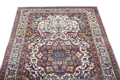 Surface texture of 1900s Tehran rug with natural Wool and intricate pattern