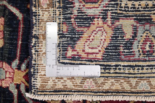 Close-up detail of 1900s Tehran rug from Iran / Persia showing Wool weave