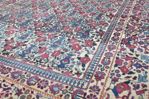 Surface texture of 1930s Tehran rug with natural Wool and intricate pattern