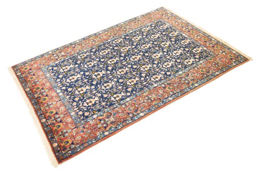 Close-up detail of 1940s Varamin rug from Iran / Persia showing Wool weave