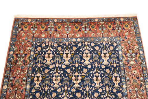Surface texture of 1940s Varamin rug with natural Wool and intricate pattern