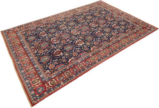 Corner detail of 1950s Varamin rug showing border pattern and Wool pile