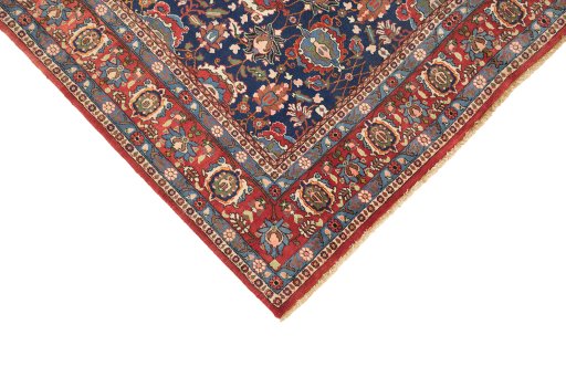 Backside of handmade 1950s Varamin rug showing knot structure and weave density