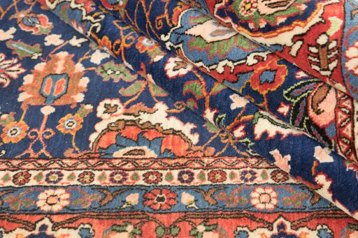 Close-up detail of 1950s Varamin rug from Iran / Persia showing Wool weave