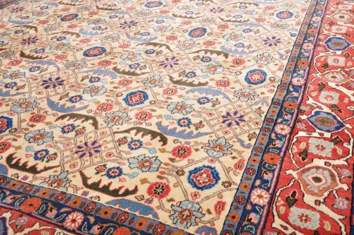 Surface texture of 2000s Varamin rug with natural Wool and intricate pattern
