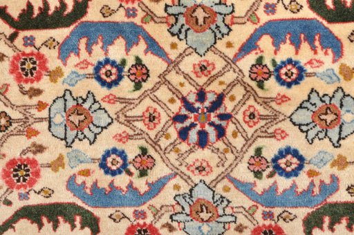 Corner detail of 2000s Varamin rug showing border pattern and Wool pile
