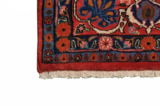 Surface texture of 2000s Varamin rug with natural Wool and intricate pattern