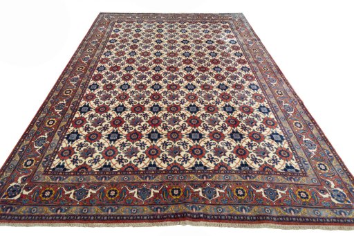 Surface texture of 2000s Varamin rug with natural Wool and intricate pattern