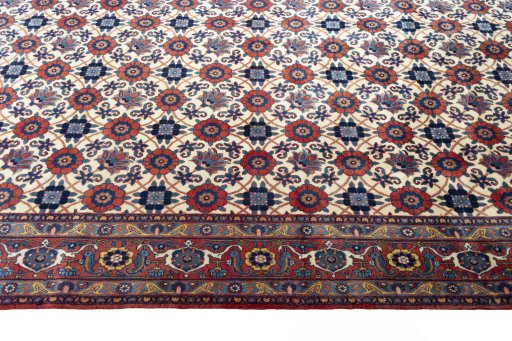 Close-up detail of 2000s Varamin rug from Iran / Persia showing Wool weave