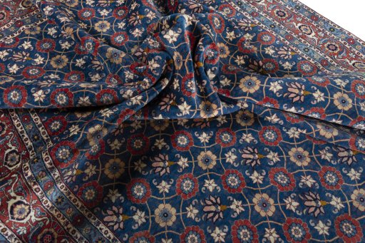 Corner detail of 1950s Varamin rug showing border pattern and Wool pile