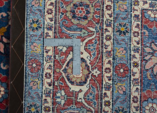 Close-up detail of 1950s Varamin rug from Iran / Persia showing Wool weave
