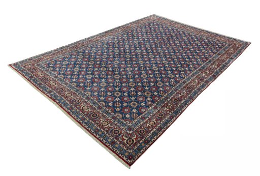 Corner detail of 1950s Varamin rug showing border pattern and Wool pile