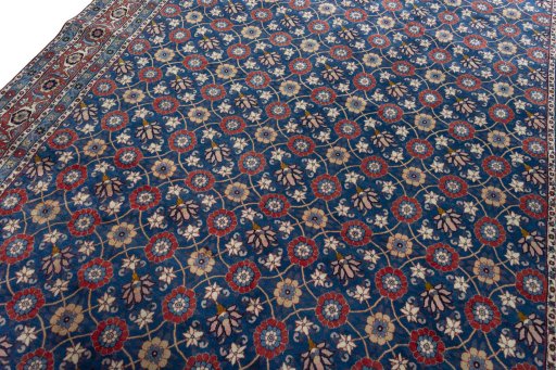 Backside of handmade 1950s Varamin rug showing knot structure and weave density