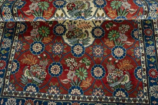 Corner detail of New Varamin rug showing border pattern and Wool pile