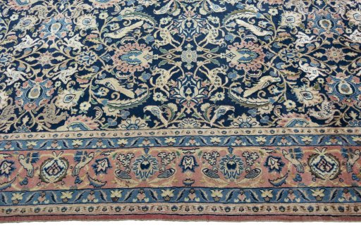 Corner detail of 2000s Varamin rug showing border pattern and Wool pile