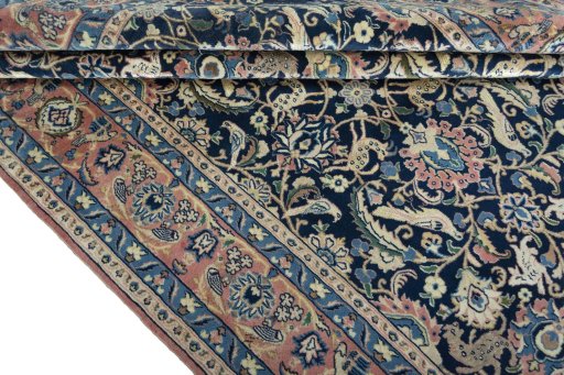 Close-up detail of 2000s Varamin rug from Iran / Persia showing Wool weave