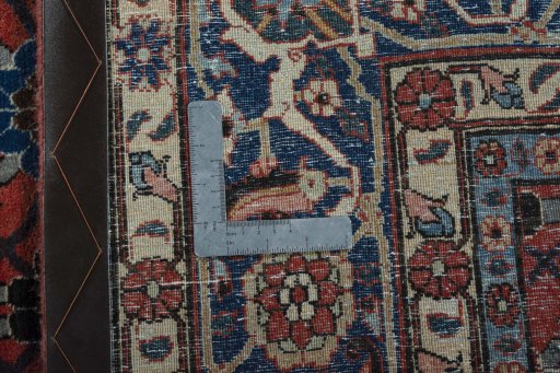 Backside of handmade 1950s Varamin rug showing knot structure and weave density
