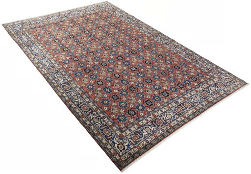 Close-up detail of 1950s Varamin rug from Iran / Persia showing Wool weave