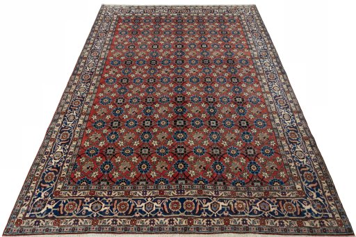 Surface texture of 1950s Varamin rug with natural Wool and intricate pattern