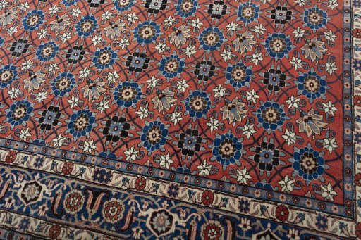 Close-up detail of 1950s Varamin rug from Iran / Persia showing Wool weave