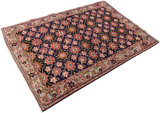 Close-up detail of 1980s Varamin rug from Iran / Persia showing Wool weave