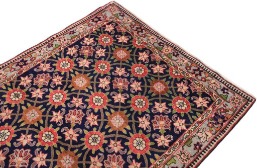 Surface texture of 1980s Varamin rug with natural Wool and intricate pattern