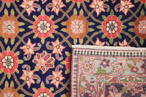 Close-up detail of 1980s Varamin rug from Iran / Persia showing Wool weave
