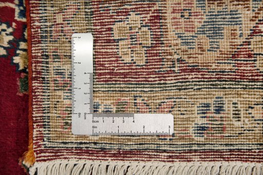 Full view of 1950s Yazd rug from Iran / Persia, 227 × 135 cm in Red tones