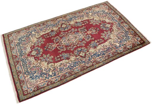 Corner detail of 1950s Yazd rug showing border pattern and Wool pile