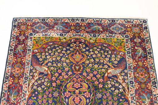 Surface texture of 1920s Yazd rug with natural Wool and intricate pattern